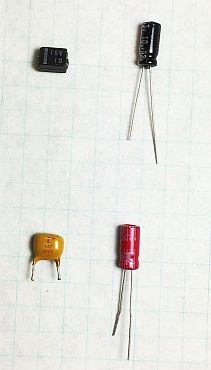 Old tantalum capacitors and proposed replacements.